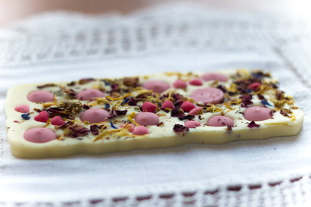 Original Polish white chocolate with straberry candies and sweet herbs. Hand made dessert snack on...