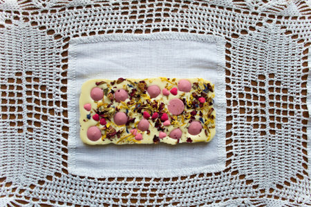 Original Polish white chocolate with straberry candies and sweet herbs. Hand made dessert snack on...