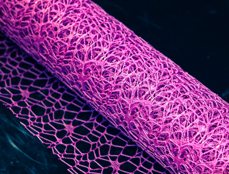 Colorful purple decorative net cloth for decorating flowers. Pattern, rolled upの写真素材