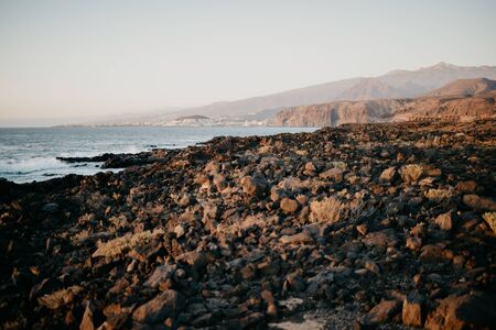 Rocky shore of the ocean on the sunset. Tenerifeの写真素材
