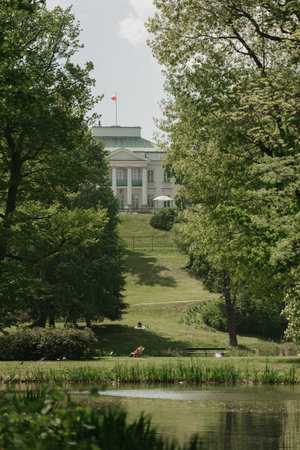 The Belweder Palace between trees at noon