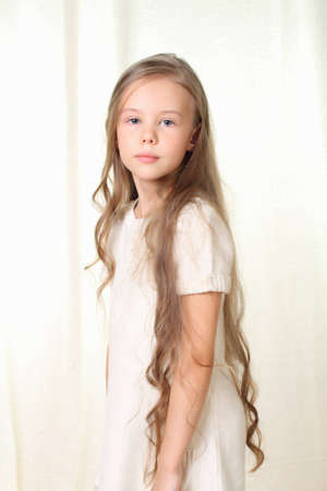 Portrait of little blond girlの写真素材