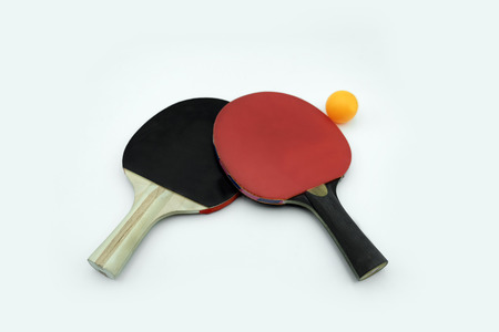Table Tennis Rackets with Ping Pong Ball on white backgroundの写真素材