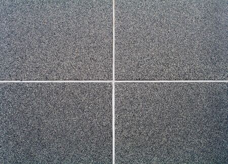 Tiled wall, gray / black. Texture, background.の写真素材