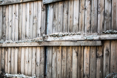 Old faded wooden fence. Background, outdoor.の写真素材