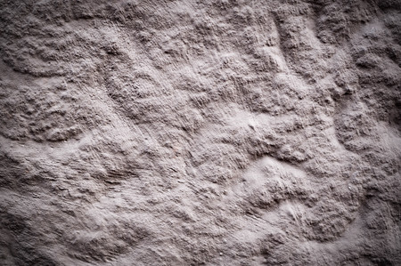 wall with white textured paint. vignette, background, exterior.の写真素材