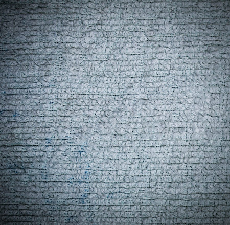 white detailed fabric terry cloth texture close-up with vignette. background, still life.
