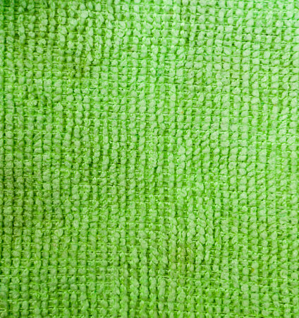 green fabric towel background. texture, domestic