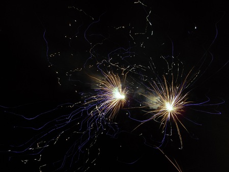 tracing capture of a firework in full explosionの写真素材