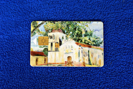 Collection of public telephone cards and old and collectible cell phones from Venezuelaの写真素材