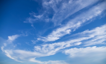 Beautiful background of blue sky with white cloudsの写真素材