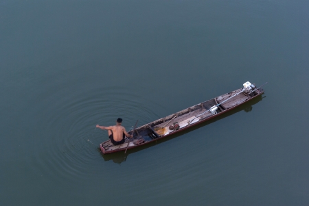 Fisherman prepare fishing on the traditional boat, thailandの写真素材