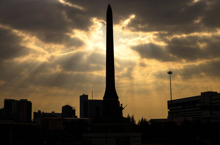 sun ray at victory monument, public domain in central of bangkok, thailandの写真素材