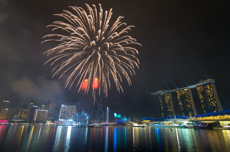 SINGAPORE - JULY 7: Fireworks over Marina Bay during Singapore National Day Parade 2012 Combined Rehearsal July 7, 2012 in Singapore.のeditorial素材