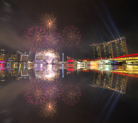 SINGAPORE - JULY 7: Fireworks over Marina Bay during Singapore National Day Parade 2012 Combined Rehearsal July 7, 2012 in Singapore.のeditorial素材