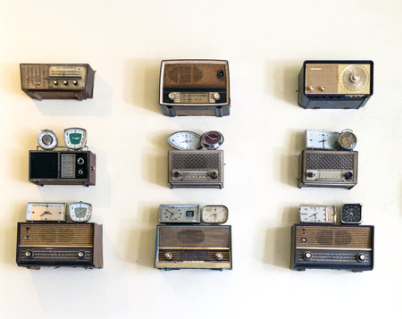 set of oldie radios and clockの写真素材
