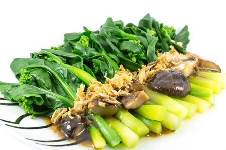 chinese broccoli fried with oyster sauce in the plateの写真素材