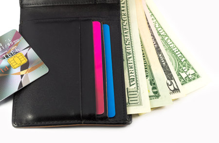 US dollars in wallet with credit card
