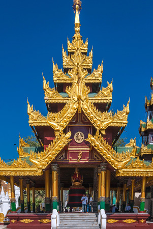 YANGON, MYANMAR - DEC 31: Undefined Buddhist procession do worship around Shwedagon at Pagoda December 31, 2010 in Yangon. is a spectacular work of Burmese temple in yangon,Myanmarのeditorial素材