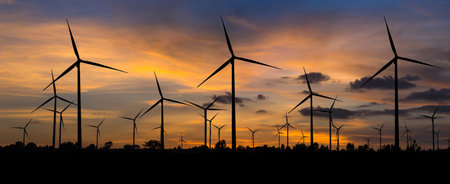 Wind turbine power generator with panorama at twilight time