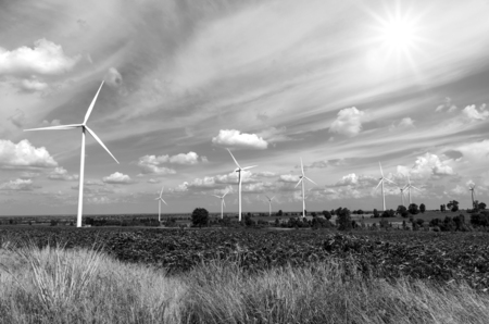 Wind turbine power generator on blue skyの写真素材
