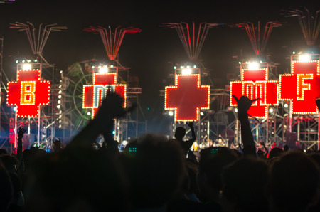 Rock concert, silhouettes of many people enjoying rock concert, music festivalのeditorial素材