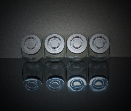 spices Glass Bottles on the shelfの写真素材