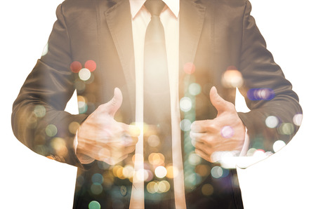 Double exposure of businessman with cityscapeの写真素材