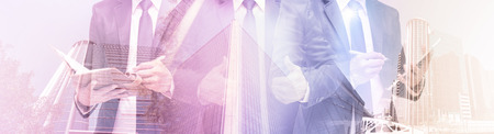 Double exposure of businessman with cityscape, Modern glass Business buildingの写真素材