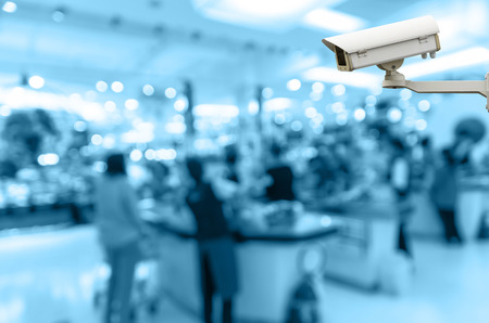 Security camera monitoring the cashier store blur with bokeh background Security camera monitoring the cashier store blur with bokeh background