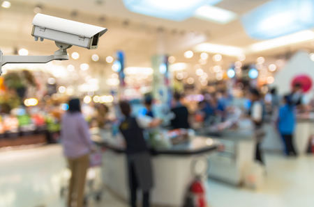 Security camera monitoring the cashier store blur with bokeh backgroundの写真素材