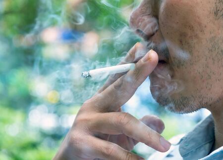 Smoking cigaretteの写真素材