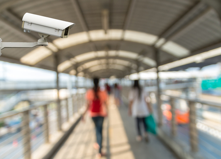 CCTV security camera on monitor the Abstract blurred photo of people with pathway skywalkerの写真素材