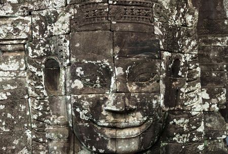 Closeup the Stone face of Ancient Bayon Temple at Angkor Thom. Siem Reap, Cambodiaの写真素材