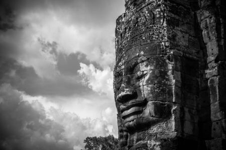 Closeup the Stone face of Ancient Bayon Temple at Angkor Thom. Siem Reap, Cambodiaの写真素材