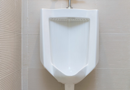 Urinal in male restroomの写真素材