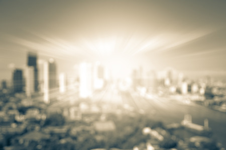 abstract Blurred photo of cityscape with sun background, blur backgrounds concept.の写真素材