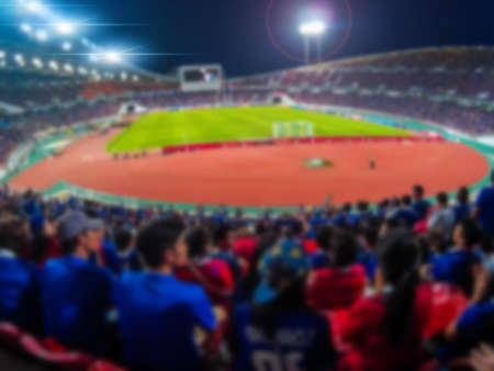 Abstract blurred photo of soccer stadium, sport background conceptの写真素材