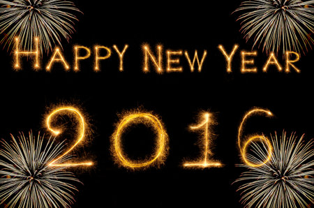 Happy new year 2016 written with Sparkle firework on black