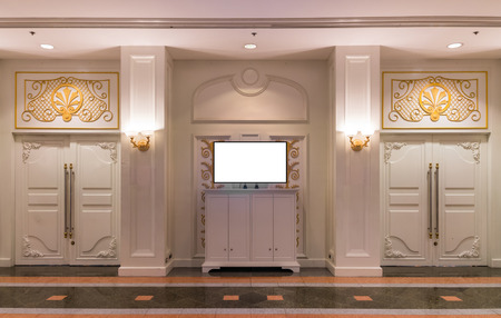 Closed door of meeting room in a luxury hotel with monitor on the tableのeditorial素材