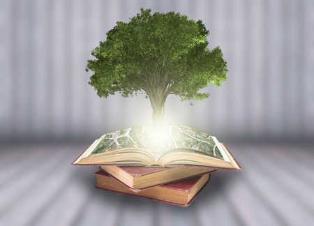 Tree growing from the old books, Education and knowledge concept