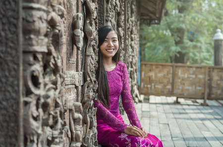 Beautiful Burmese girl smiling at Shwenandaw pagoda, mandalay, myanmarの写真素材