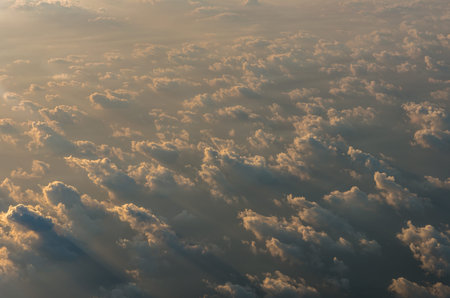 clouds on the sky from high view with worm white balance