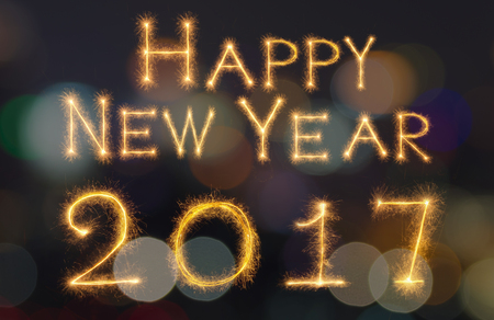 Happy new year 2017 written with Sparkle firework on black background, celebration and greeting...