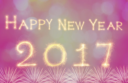 Happy new year 2017 written with Sparkle firework on black background, celebration and greeting...