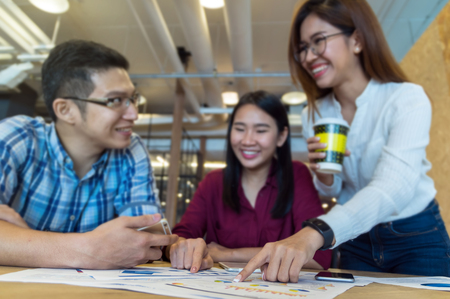 Group Of Business people with casual suit Meeting In the modern coffee shop, closeup at finger, business group conceptの写真素材