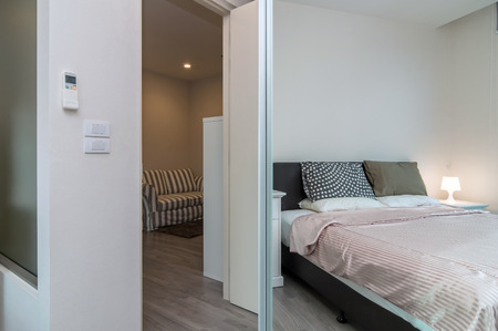 Luxury Interior bedroom which can see living room