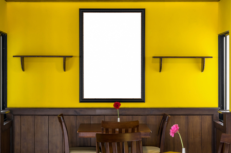 Luxury restaurant set with yellow color wall with big photo frame, decirate conceptの写真素材