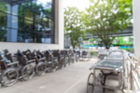 Abstract photo blurred of hospital background with patient chair background, Hospital and physician conceptの写真素材