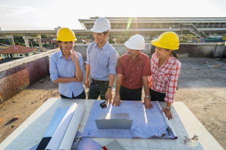 Happy professional construction engineers working with Corporate Colleagues Teamwork and equipment...